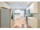 Spacious kitchen with stainless steel appliances, ample countertop space, and modern lighting at 208 State St, Walterboro, SC 29488