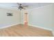 Spacious room featuring modern flooring, access to other rooms, and neutral-colored walls at 208 State St, Walterboro, SC 29488