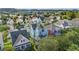 A beautiful aerial view showcases a neighborhood with colorful homes and lush green trees at 209 Barberry St, Summerville, SC 29483