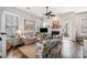 Bright and inviting living room with a fireplace, plush seating, and stylish decor at 209 Barberry St, Summerville, SC 29483