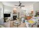Cozy living room with a fireplace, comfortable seating, and a view into the dining area at 209 Barberry St, Summerville, SC 29483