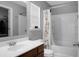 Well-lit bathroom with a tub and shower combination, and a single sink vanity with a white countertop at 213 Avonshire Dr, Summerville, SC 29483