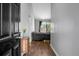 Open entryway with wood floors, gray walls, and a glimpse of the living area at 213 Avonshire Dr, Summerville, SC 29483