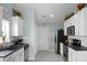 Kitchen featuring white cabinets, subway tile backsplash, and stainless steel appliances at 213 Avonshire Dr, Summerville, SC 29483