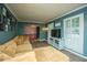Comfortable living room featuring natural light, plush couch, and stylish decor at 215 Bramblewood Dr, Summerville, SC 29485