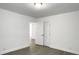 Bright bedroom with modern lighting, closet, and new flooring at 2174 Eleanor Dr, North Charleston, SC 29406