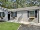 Charming house with stone accents, flower boxes, neat lawn and newly planted garden at 2174 Eleanor Dr, North Charleston, SC 29406
