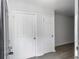Hallway featuring new flooring and freshly painted doors at 2174 Eleanor Dr, North Charleston, SC 29406