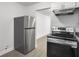 Kitchen features a new stainless steel refrigerator and laminate countertops at 2174 Eleanor Dr, North Charleston, SC 29406