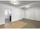 Bright living room featuring a dining area with tile, light gray floors, and white walls at 2174 Eleanor Dr, North Charleston, SC 29406