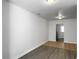 Bright living room featuring grey hardwood floors, white walls, and recessed lighting throughout at 2174 Eleanor Dr, North Charleston, SC 29406