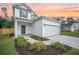 The property has a two-car garage and neat landscaping at 224 Wappoo Trace Ln, Summerville, SC 29486