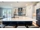 Island kitchen with lots of seating space and pendant lights at 224 Wappoo Trace Ln, Summerville, SC 29486
