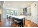 Modern kitchen with a large island, seating, and stainless steel appliances at 224 Wappoo Trace Ln, Summerville, SC 29486