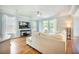 Spacious living area featuring hardwood floors, a modern TV, and comfortable seating at 224 Wappoo Trace Ln, Summerville, SC 29486