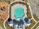 Overhead shot of community pool, playground, walkways, and manicured landscaping at 224 Wappoo Trace Ln, Summerville, SC 29486
