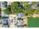 Tranquil community living on a lakefront with mature trees offers a beautiful aerial perspective at 2257 Magnolia Meadows Dr, Mount Pleasant, SC 29464