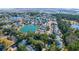 Panoramic aerial view captures a charming neighborhood surrounding a serene lake, close to the ocean at 2257 Magnolia Meadows Dr, Mount Pleasant, SC 29464