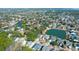 Expansive aerial view showcases homes in a community surrounding a serene lake and natural beauty at 2257 Magnolia Meadows Dr, Mount Pleasant, SC 29464