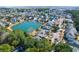 Stunning aerial view of the community around a tranquil lake showcasing desirable coastal real estate at 2257 Magnolia Meadows Dr, Mount Pleasant, SC 29464