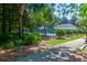Community pool enclosed by greenery, offering a refreshing outdoor space for residents to enjoy at 2257 Magnolia Meadows Dr, Mount Pleasant, SC 29464
