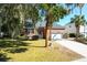 Charming single-Gathering home with brick facade, lush landscaping and attached garage at 2257 Magnolia Meadows Dr, Mount Pleasant, SC 29464