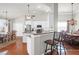 Modern kitchen with white cabinets, granite countertops, and stainless steel appliances at 2257 Magnolia Meadows Dr, Mount Pleasant, SC 29464