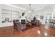Open concept living room featuring hardwood floors, fireplace, and plenty of seating at 2257 Magnolia Meadows Dr, Mount Pleasant, SC 29464
