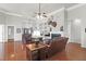 Bright living room with hardwood flooring, a fireplace, and comfortable seating at 2257 Magnolia Meadows Dr, Mount Pleasant, SC 29464