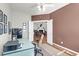 Home office features a ceiling fan and access to the living room at 2257 Magnolia Meadows Dr, Mount Pleasant, SC 29464