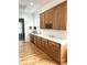 A bar area boasts custom wood cabinets, a wine rack, and a beverage fridge at 2293 Beckenham Dr, Mount Pleasant, SC 29466