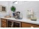 The beverage bar is decorated with gold accents and a stylish coffee machine at 2293 Beckenham Dr, Mount Pleasant, SC 29466
