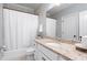 Bathroom featuring a granite countertop, tub with shower and modern finishes at 2293 Beckenham Dr, Mount Pleasant, SC 29466