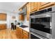 Gourmet kitchen featuring modern stainless steel appliances and stylish wooden cabinetry at 2293 Beckenham Dr, Mount Pleasant, SC 29466