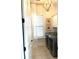 The laundry room has modern washer and dryer, and custom white cabinets at 2293 Beckenham Dr, Mount Pleasant, SC 29466