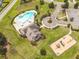 An aerial view of a beautiful community with a pool, playground, and pond at 240 Mayfield Dr, Goose Creek, SC 29445