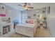 This bedroom is decorated with a fluffy white bed and colorful accent pieces, complemented by soft natural light at 240 Mayfield Dr, Goose Creek, SC 29445