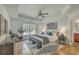 A well-lit main bedroom with tray ceiling and contemporary furnishings at 240 Mayfield Dr, Goose Creek, SC 29445