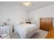 Cozy bedroom with a comfortable bed, ceiling fan, and traditional furnishings at 241 Kelsey Blvd, Wando, SC 29492