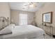 Bedroom with full bed, ceiling fan, vaulted ceiling and side table at 241 Kelsey Blvd, Wando, SC 29492