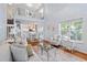 Inviting living room with hardwood floors, view of dining area, and vaulted ceilings at 241 Kelsey Blvd, Wando, SC 29492