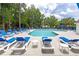 Beautiful community pool with plenty of lounge chairs for relaxing and soaking up the sun at 241 Kelsey Blvd, Wando, SC 29492