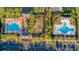 Aerial view of community amenities including pools, a playground, and meticulously maintained landscaping at 2582 Kingsfield St, Mount Pleasant, SC 29466