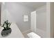 Bright bathroom featuring a shower with white tile and a white countertop with a cactus at 2582 Kingsfield St, Mount Pleasant, SC 29466