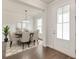 Elegant dining room with modern chandelier, round table, and comfortable seating, creating a welcoming atmosphere at 2582 Kingsfield St, Mount Pleasant, SC 29466