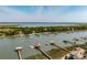 Aerial view of waterfront neighborhood featuring private docks, scenic views, and tranquil water ways at 2619 Buccaneer Rd, Isle of Palms, SC 29451