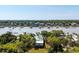 Breathtaking aerial view showcasing waterfront property with private docks and expansive water views reaching the ocean at 2619 Buccaneer Rd, Isle of Palms, SC 29451