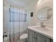 A bathroom including a vanity, toilet, and shower/tub with shower curtain at 2619 Buccaneer Rd, Isle of Palms, SC 29451