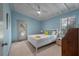 The bedroom features a window, queen bed, and ceiling fan providing comfort and natural light at 2619 Buccaneer Rd, Isle of Palms, SC 29451