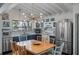 Inviting kitchen featuring modern lighting, stainless steel appliances, and a cozy breakfast nook at 2619 Buccaneer Rd, Isle of Palms, SC 29451